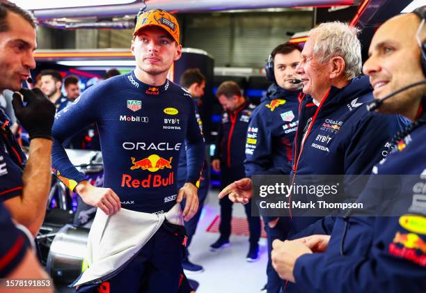 Max Verstappen of the Netherlands and Oracle Red Bull Racing talks with his team in the garage prior to the Sprint Shootout ahead of the F1 Grand...