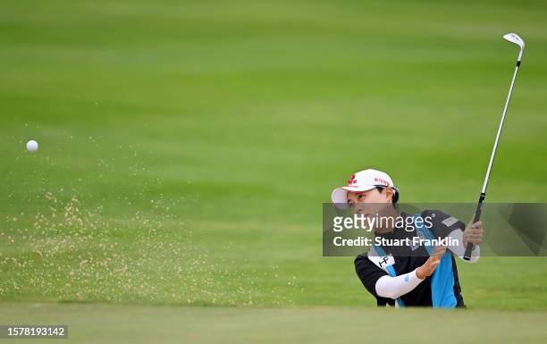 Hyo Joo Kim of South Korea plays a shot from a bunker on the 15th hole during the Third Round of the Amundi Evian Championship at Evian Resort Golf...