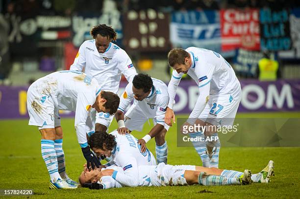 Lazio's players celebrate after scoring a goal during their UEFA Europa League football match NK Maribor vs. S.S. Lazio in Maribor, on December 6,...