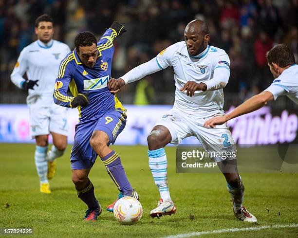 Marcos Tavares of Maribor vies for the ball with Michael Ciani of Lazio during their UEFA Europa League football match NK Maribor vs. S.S. Lazio in...