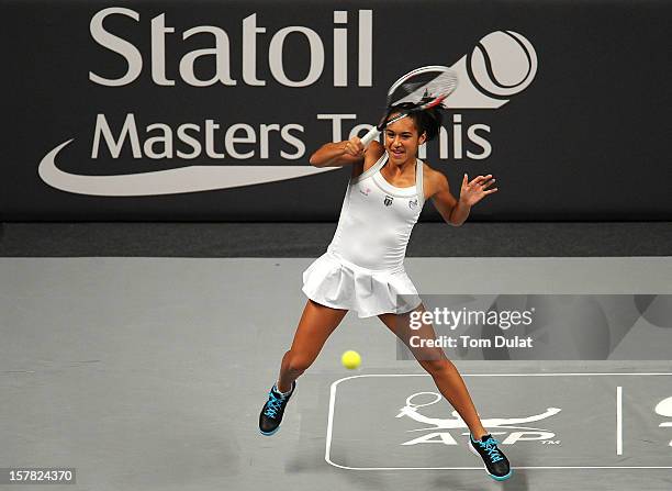 Heather Watson of Great Britain in action during match against Mark Philippoussis of Australia and Anne Keothavong of Great Britain on Day Two of the...