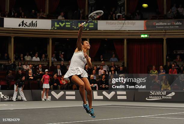 Heather Watson of Great Britain in action during match against Mark Philippoussis of Australia and Anne Keothavong of Great Britain on Day Two of the...