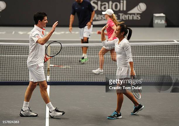 Heather Watson and Tim Henman of Great Britain during match against Mark Philippoussis of Australia and Anne Keothavong of Great Britain on Day Two...