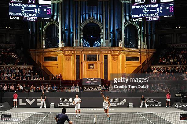 Heather Watson and Tim Henman of Great Britain during match against Mark Philippoussis of Australia and Anne Keothavong of Great Britain on Day Two...