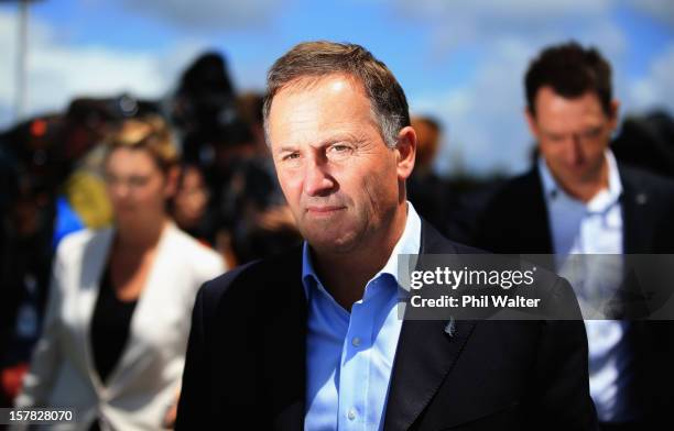 New Zealand Prime Minister John Key fronts the media in the Auckland suburb of Hobsonville following a tornado that struck yesterday on December 7,...