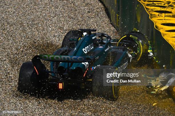 Lance Stroll of Canada driving the Aston Martin AMR23 Mercedes crashes during the Sprint Shootout ahead of the F1 Grand Prix of Belgium at Circuit de...