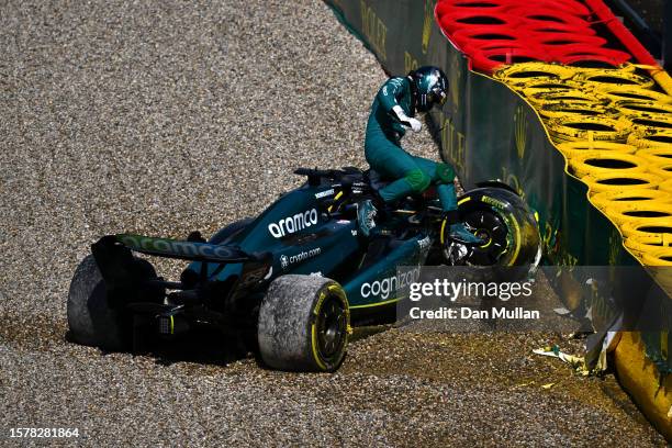 Lance Stroll of Canada driving the Aston Martin AMR23 Mercedes crashes during the Sprint Shootout ahead of the F1 Grand Prix of Belgium at Circuit de...