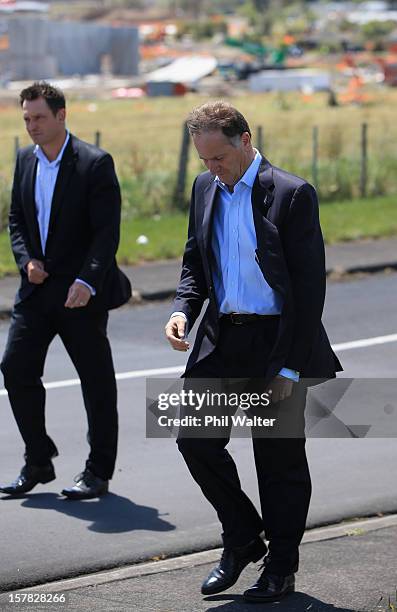 New Zealand Prime Minister John Key fronts the media in the Auckland suburb of Hobsonville following a tornado that struck yesterday on December 7,...