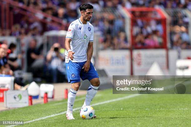 Lars Stindl of Karlsruhe runs with the ball during the Second Bundesliga match between VfL Osnabrück and Karlsruher SC at Bremer Bruecke on July 29,...