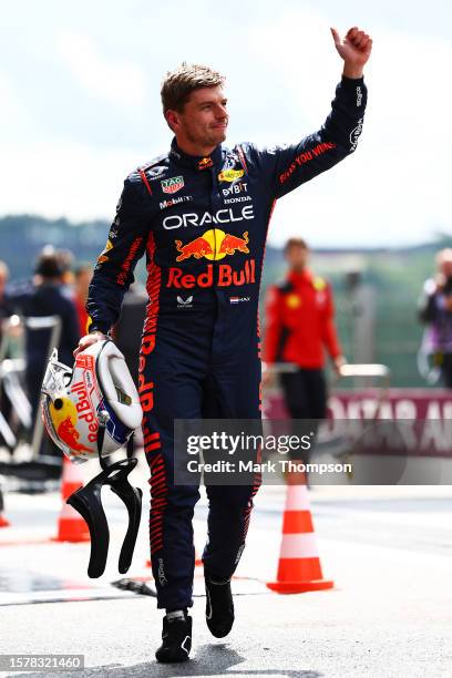 Sprint Shootout fastest qualifier Max Verstappen of the Netherlands and Oracle Red Bull Racing waves to the crowd in parc ferme during the Sprint...