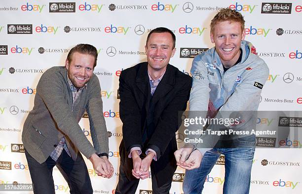 Olympic gold medal winners Jonas Reckermann , Ebay general manager of Germany Martin Tschopp and Julius Brink attend the Ebay Pop-Up Store opening at...