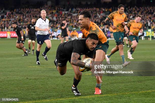 Rieko Ioane of the All Blacks scores a try during the The Rugby Championship & Bledisloe Cup match between the Australia Wallabies and the New...