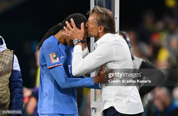 Wendie Renard of France is congratulated by head coach Herve Renard after the team's 2-1 victory in the FIFA Women's World Cup Australia & New...