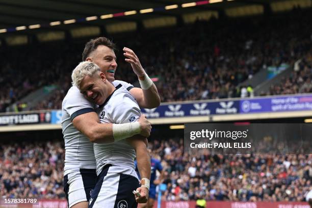 Scotland's wing Darcy Graham celebrates after scoring a try during the Pre-World Cup Friendly Rugby Union match between Scotland and France at...