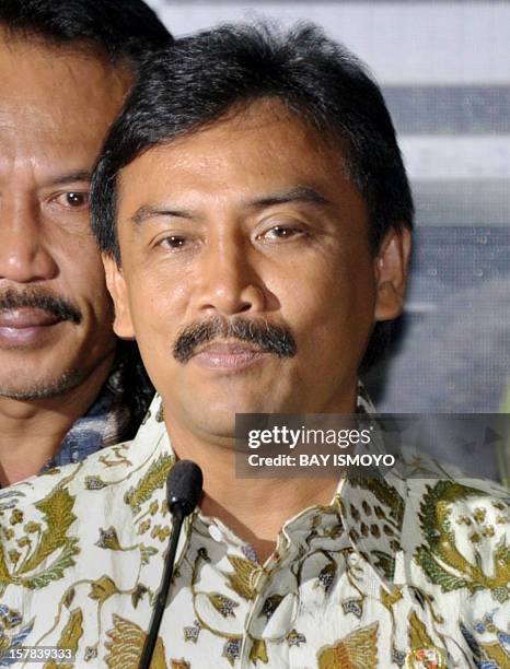 Sport Minister Andi Mallarangeng speaks during a press conference in Jakarta on December 7, 2012 to announce his resignation and becomes the first...
