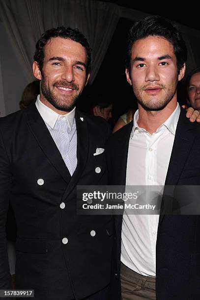 Carlos Huber and Joseph Altuzarrra attend the amfAR Inspiration Miami Beach Party at Soho Beach House on December 6, 2012 in Miami Beach, Florida.