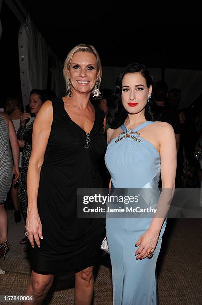 Karen Buglisi and Dita Von Teese attend the amfAR Inspiration Miami Beach Party at Soho Beach House on December 6, 2012 in Miami Beach, Florida.