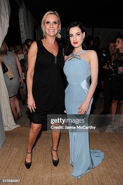 Karen Buglisi and Dita Von Teese attend the amfAR Inspiration Miami Beach Party at Soho Beach House on December 6, 2012 in Miami Beach, Florida.