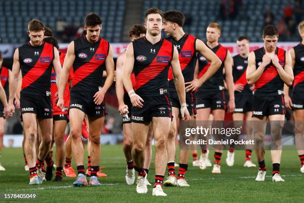 Zach Merrett of the Bombers leads the team off the field after the round 20 AFL match between Essendon Bombers and Sydney Swans at Marvel Stadium, on...