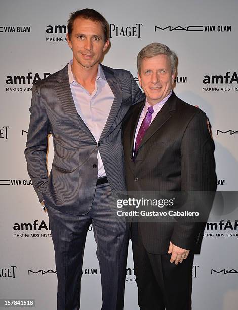 Jeff Hall and Larry Boland attend the amfAR Inspiration Miami Beach Party at Soho Beach House on December 6, 2012 in Miami Beach, Florida.