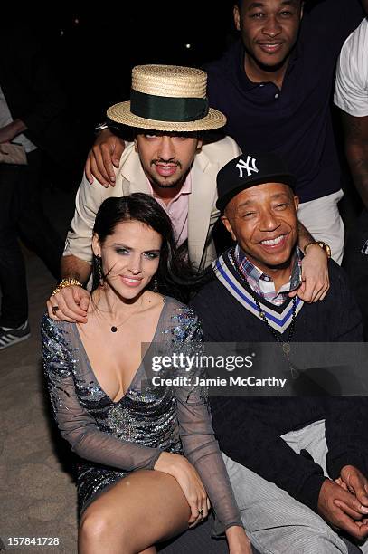 Hana Nitsche, DJ Cassidy and Russell Simmons attend the amfAR Inspiration Miami Beach Party at Soho Beach House on December 6, 2012 in Miami Beach,...