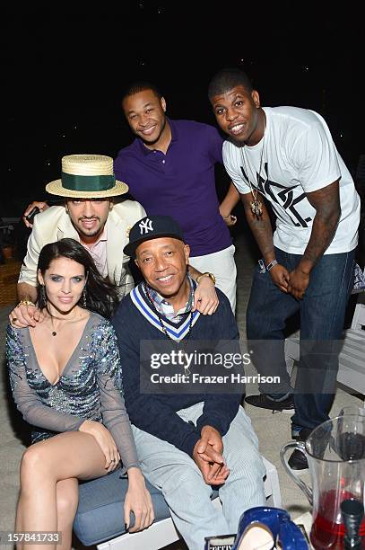 Cassidy, Hana Nitsche and Russell Simmons attends the amfAR Inspiration Miami Beach Party on December 6, 2012 in Miami Beach, United States.