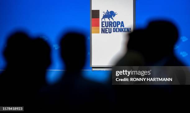 Delegates stand in front of the slogan "Rethinking Europe" during the European Election Assembly of German far-right party Alternative for Germany at...