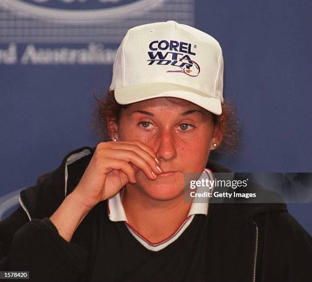 Monica Seles of the USA wipes the tears from her face after getting emotional during her post-match press conference after beating Anke Huber of...