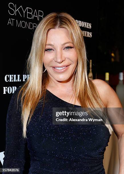 Singer Taylor Dayne attends Voli Light Vodka's Holiday Party hosted by Fergie Benefiting Cellphones for Soldiers at SkyBar at the Mondrian Los...
