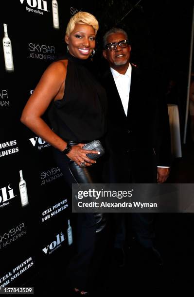 Personality Nene Leakes and Gregg Leakes attend Voli Light Vodka's Holiday Party hosted by Fergie Benefiting Cellphones for Soldiers at SkyBar at the...