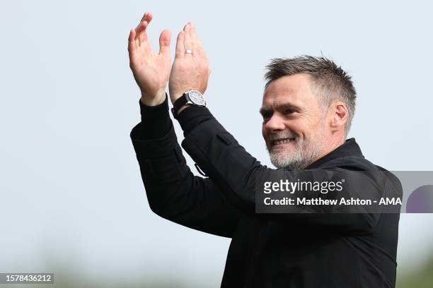 Graham Alexander the head coach / manager of MK Dons celebrates the 3-5 victory during the Sky Bet League Two match between Wrexham and Milton Keynes...
