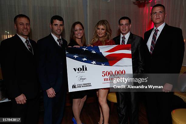 Host Fergie and Marines from Camp Pendleton attend Voli Light Vodka's Holiday Party hosted by Fergie Benefiting Cellphones for Soldiers at SkyBar at...