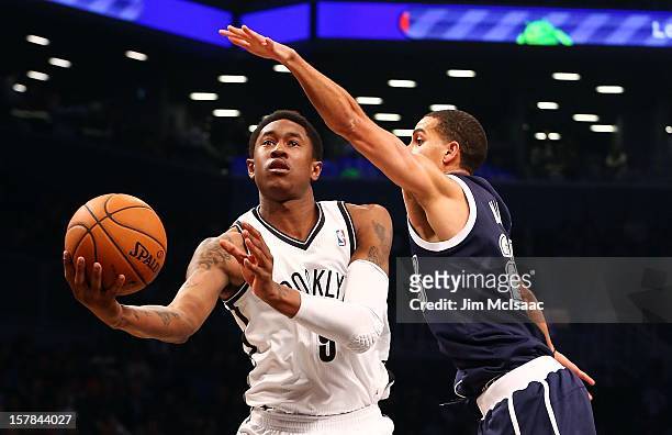 MarShon Brooks of the Brooklyn Nets in action against Kevin Martin of the Oklahoma City Thunder at Barclays Center on December 4, 2012 in the...