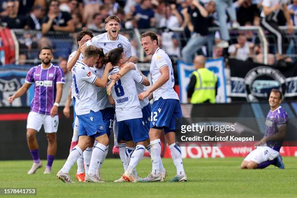 Dzenis Burnic of Karlsruhe celebrates the third goal with his team mates during the Second Bundesliga match between VfL Osnabrück and Karlsruher SC...