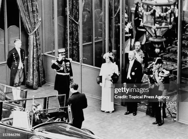 King George VI and Queen Elizabeth leave the Elysee Palace during their State Visit to Paris, France, July 1938. Between them is French President...