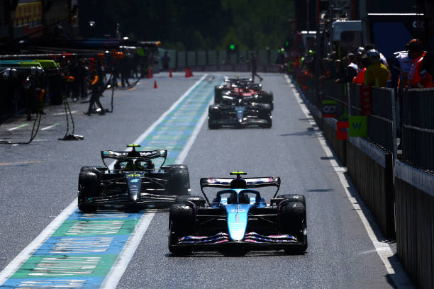 SPA, BELGIUM - JULY 29: Pierre Gasly of France driving the (10) Alpine F1 A523 Renault leads Lewis Hamilton of Great Britain driving the (44) Mercedes AMG Petronas F1 Team W14 in the Pitlane during the Sprint Shootout ahead of the F1 Grand Prix of Belgium at Circuit de Spa-Francorchamps on July 29, 2023 in Spa, Belgium.