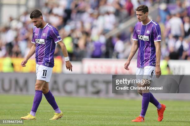 Charalampos Makridis and Maximilian Thalhammer of Osnabrueck look dejected after losing 2-3 the Second Bundesliga match between VfL Osnabrück and...