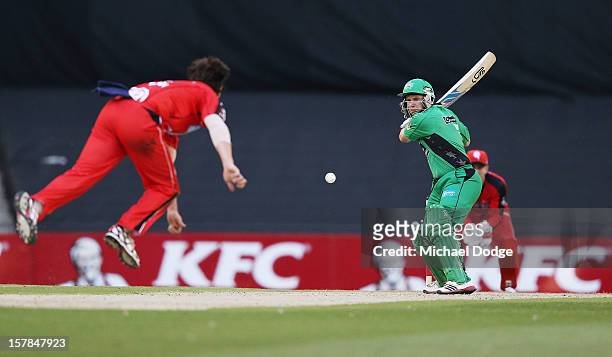 Brad Hodge of the Stars hits the ball against Will Sheridan of The Renegades during the Big Bash League match between the Melbourne Renegades and the...