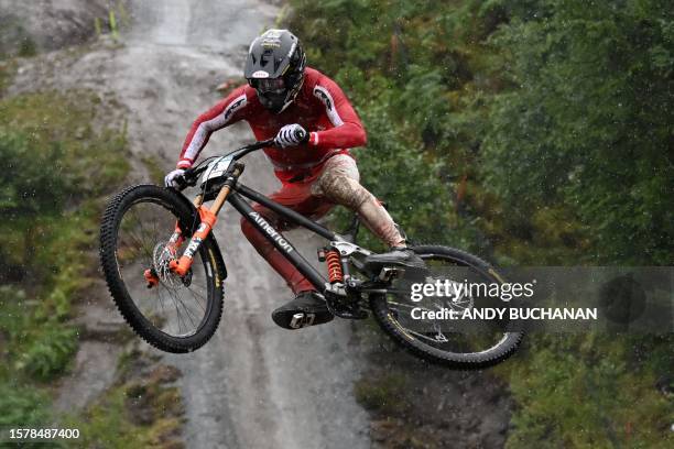 Austria's Andreas Kolb competes in the men's elite mountain bike downhill final at the Nevis Range Mountain Resort, near Fort William in the Scottish...