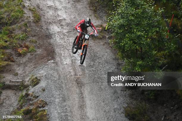 Austria's Andreas Kolb competes in the men's elite mountain bike downhill final at the Nevis Range Mountain Resort, near Fort William in the Scottish...