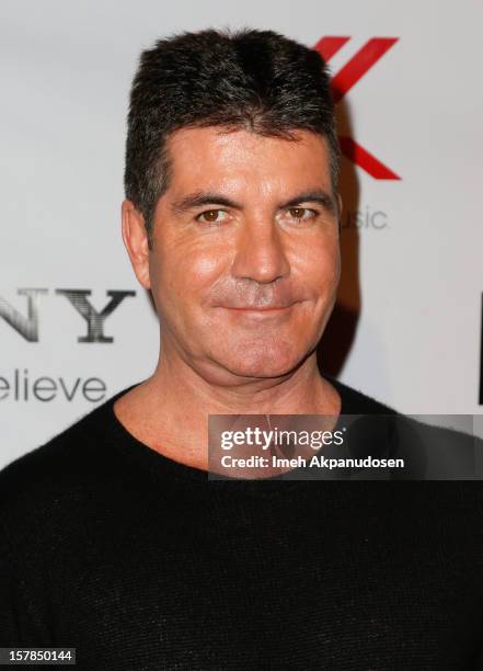 Producer Simon Cowell attends Fox's "The X Factor" viewing party at Mixology101 & Planet Dailies on December 6, 2012 in Los Angeles, California.