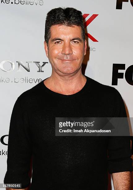 Producer Simon Cowell attends Fox's "The X Factor" viewing party at Mixology101 & Planet Dailies on December 6, 2012 in Los Angeles, California.