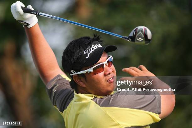 Kiradech Aphibarnrat of Thailand plays a shot during round two of the Thailand Golf Championship at Amata Spring Country Club on December 7, 2012 in...