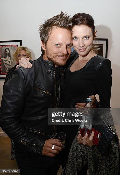 Photographer Randall Slavin and actress April Bowlby attend the opening of "Wetdreams" at Gallery Brown on December 6, 2012 in Los Angeles,...