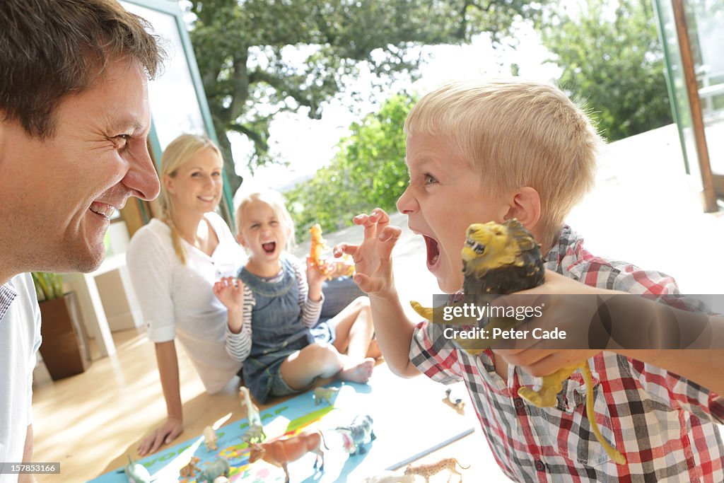 Family together, happy, playing