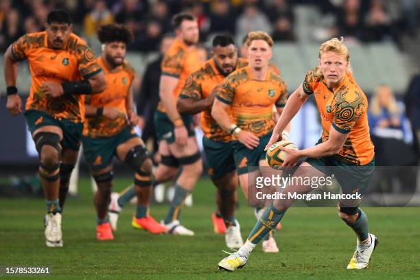 Carter Gordon of the Wallabies passes the ball during the The Rugby Championship & Bledisloe Cup match between the Australia Wallabies and the New...