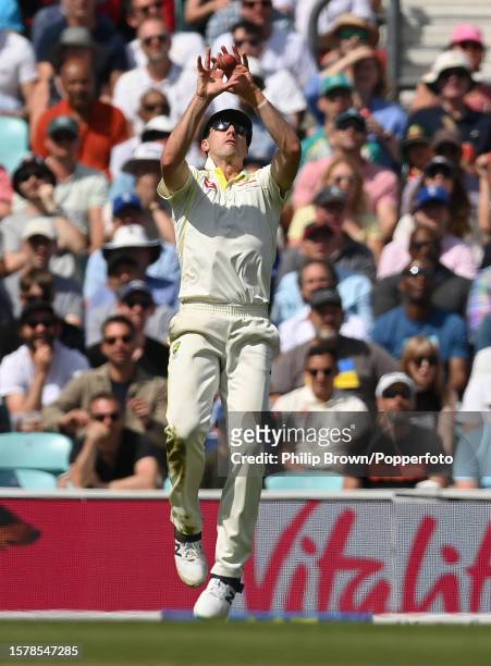 Pat Cummins of Australia catches Ben Stokes of England during the third day of the 5th Test between England and Australia at The Kia Oval on July 29,...