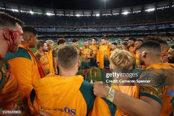 Quade Cooper of the Wallabies talks to team mates in a huddle after losing The Rugby Championship & Bledisloe Cup match between the Australia...