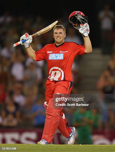 Aaron Finch of the Renegades celebrates as he reaches his century during the Big Bash League match between the Melbourne Renegades and the Melbourne...