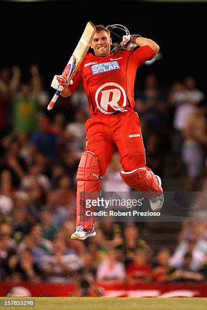 Aaron Finch of the Renegades celebrates his century during the Big Bash League match between the Melbourne Renegades and the Melbourne Stars at...